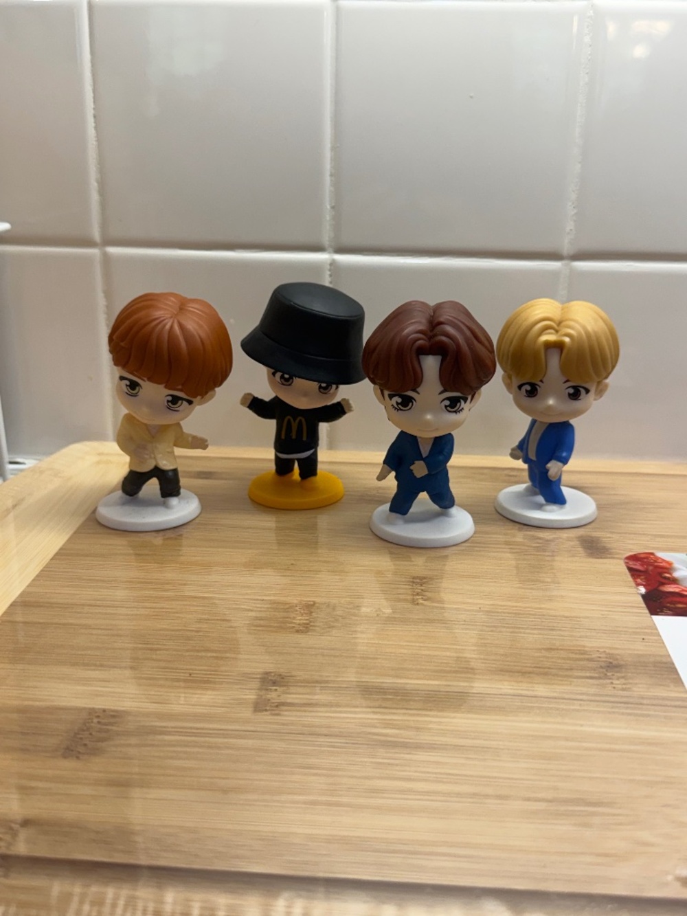 collectible TinyTAN BTS figures from the 2025 McDonald's Happy Meal